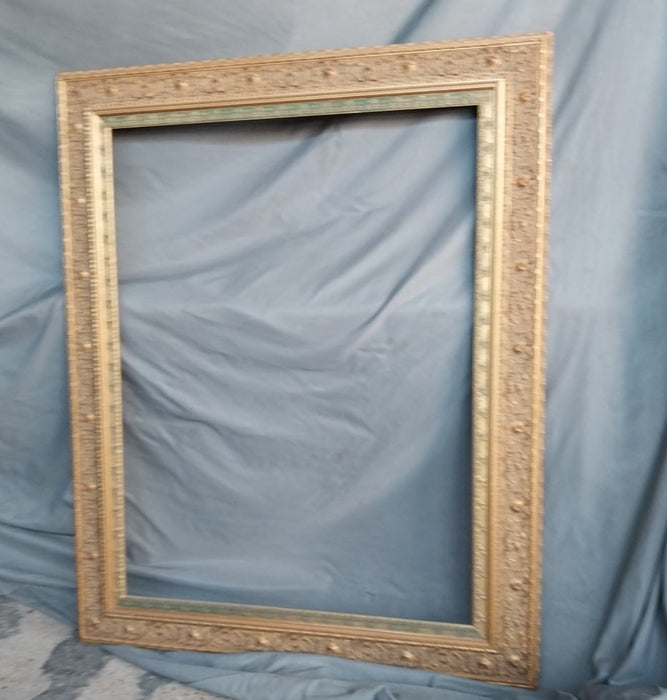 ORNATE FRAME WITH VERDIGRIS