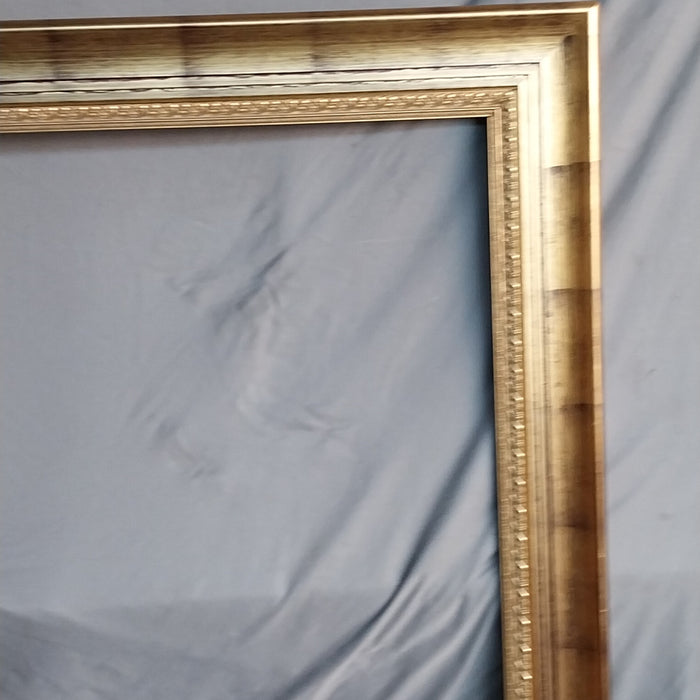 LARGE GILT FRAME WITH BLACK WASH