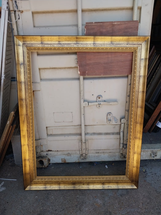 LARGE GILT FRAME WITH BLACK WASH