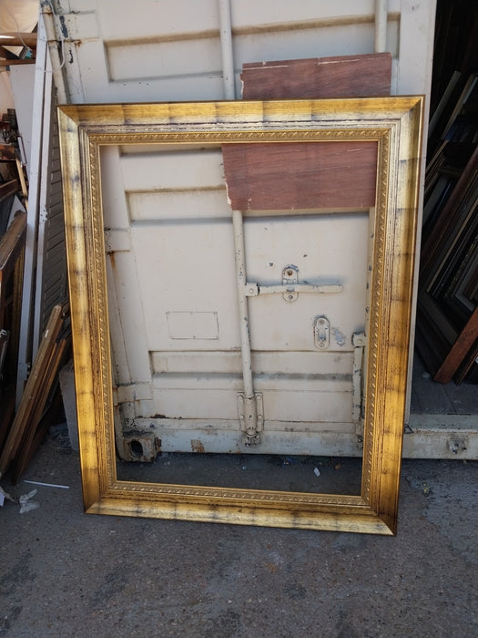 LARGE GILT FRAME WITH BLACK WASH