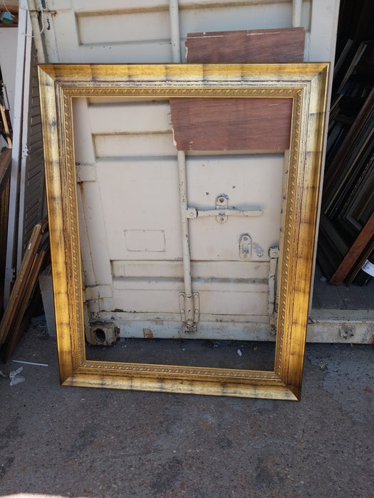 LARGE GILT FRAME WITH BLACK WASH