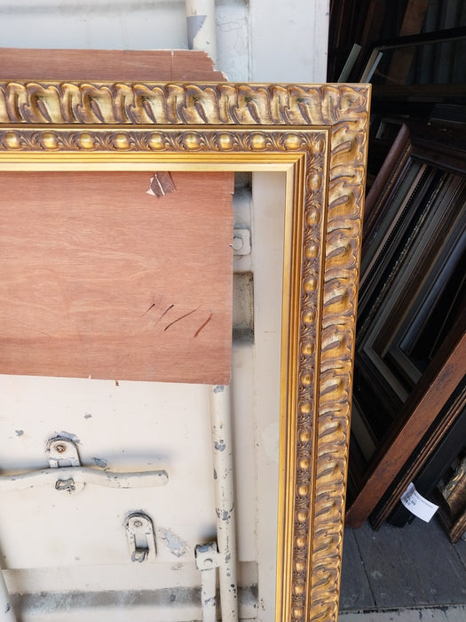 LARGE FLARED EDGE ORNATE GILT FRAME