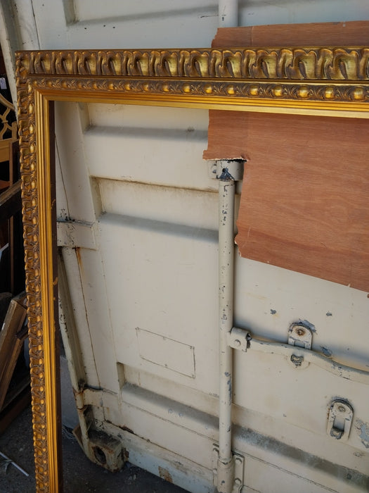 LARGE FLARED EDGE ORNATE GILT FRAME