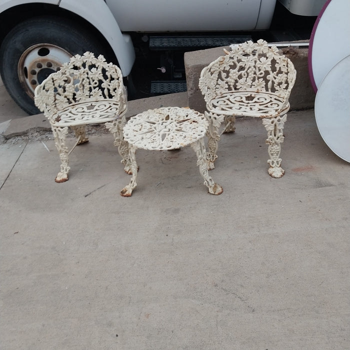 3 PIECE SET OF CAST IRON FURNITURE-2 CHAIRS AND A TABLE