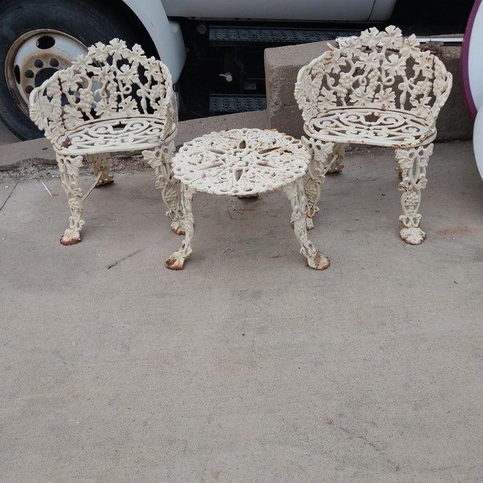 3 PIECE SET OF CAST IRON FURNITURE-2 CHAIRS AND A TABLE