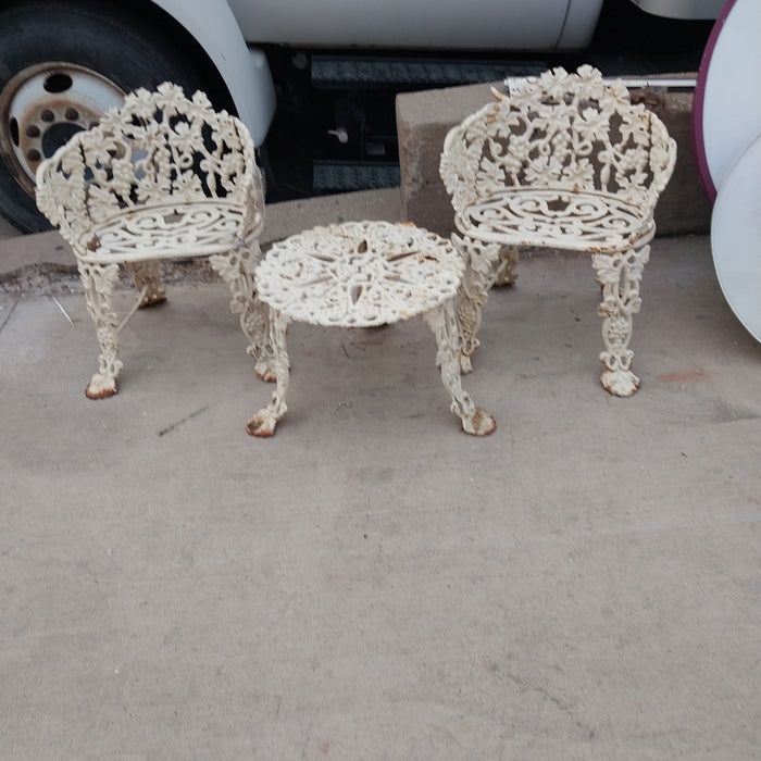 3 PIECE SET OF CAST IRON FURNITURE-2 CHAIRS AND A TABLE