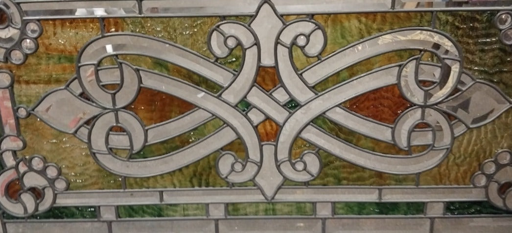 PAIR OF ORNATE STAINED GLASS TRANSOMS OR DOORS WITH BEVELED GLASS