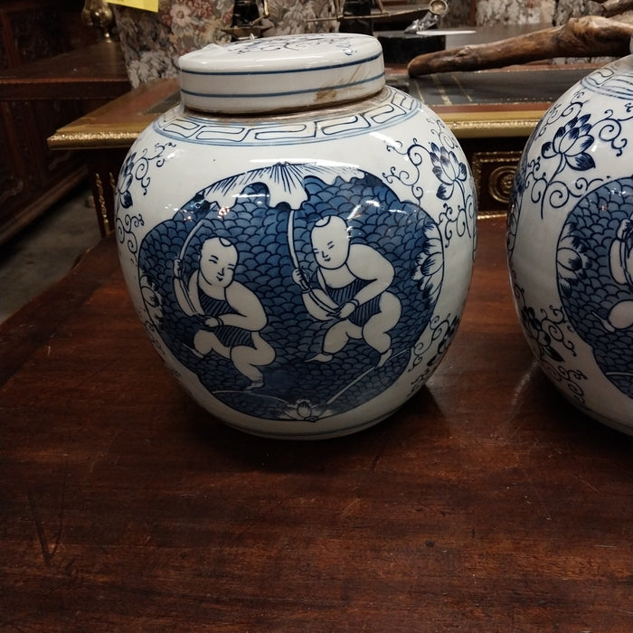PAIR OF MEDIUM BLUE AND WHITE CHINESE GINGER JARS WITH MEN