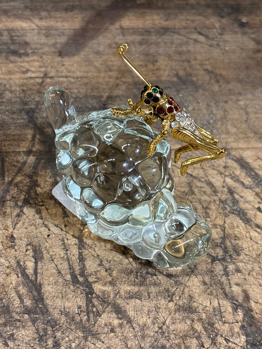JEWELED CICADA MOUNTED TO CLEAR GLASS GRAPES