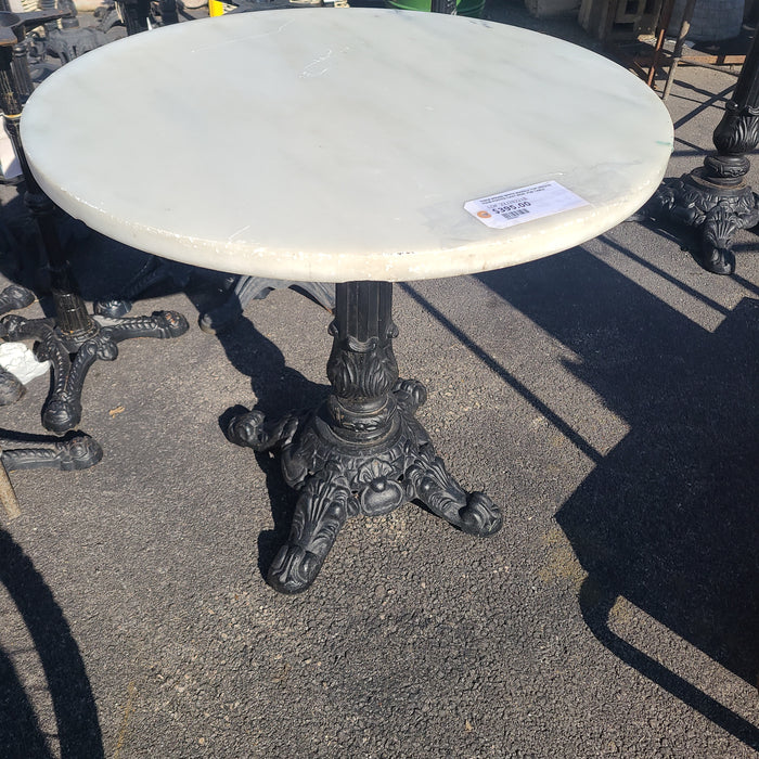 THICK ROUND WHITE MARBLE TOP ORNATE FOUR FOOTED CAST IRON  PUB TABLE