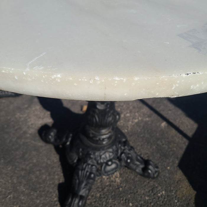 THICK ROUND WHITE MARBLE TOP ORNATE FOUR FOOTED CAST IRON  PUB TABLE