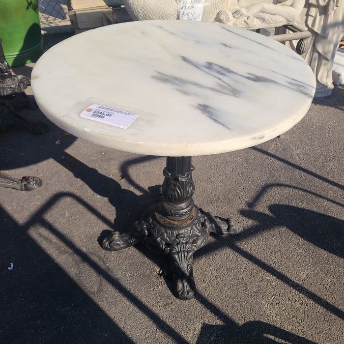 THICK ROUND WHITE MARBLE TOP ORNATE FOUR FOOTED CAST IRON  PUB TABLE