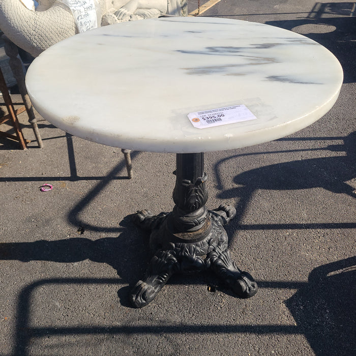 THICK ROUND WHITE MARBLE TOP ORNATE FOUR FOOTED CAST IRON  PUB TABLE