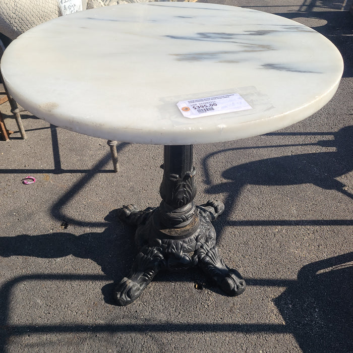 THICK ROUND WHITE MARBLE TOP ORNATE FOUR FOOTED CAST IRON  PUB TABLE