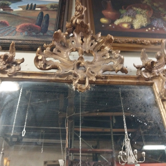LARGE CARVED GILTWOOD MIRROR