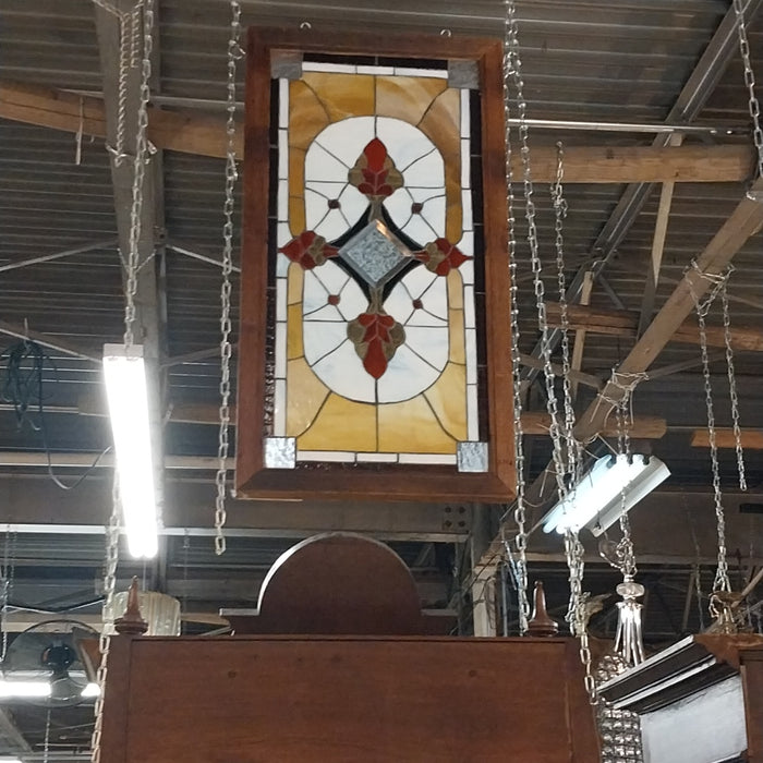 SPECTRUM ORANGE, WHITE AND BROWN STAINED GLASS WINDOW