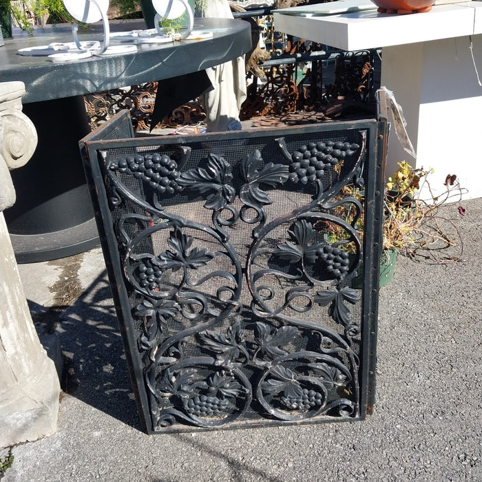 SMALL CAST IRON AND MESH FIRE SCREEN