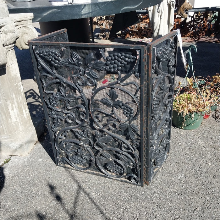 SMALL CAST IRON AND MESH FIRE SCREEN