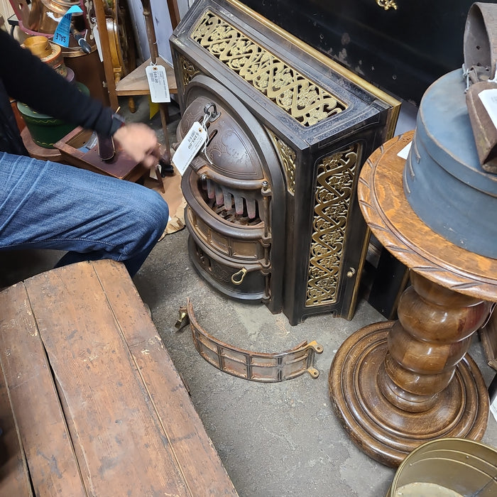 CAST IRON AND BRASS HEATER AS FOUND