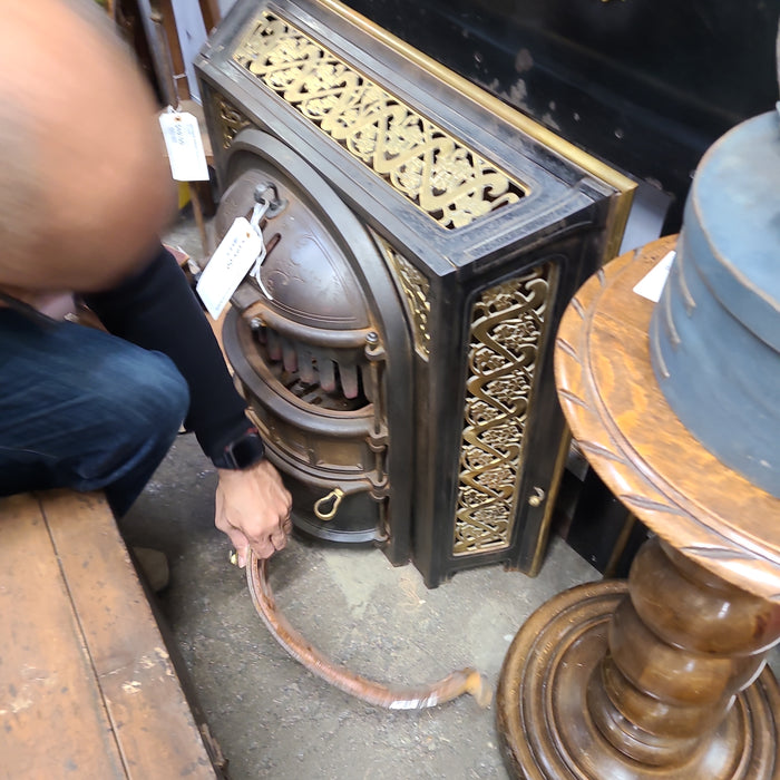 CAST IRON AND BRASS HEATER AS FOUND