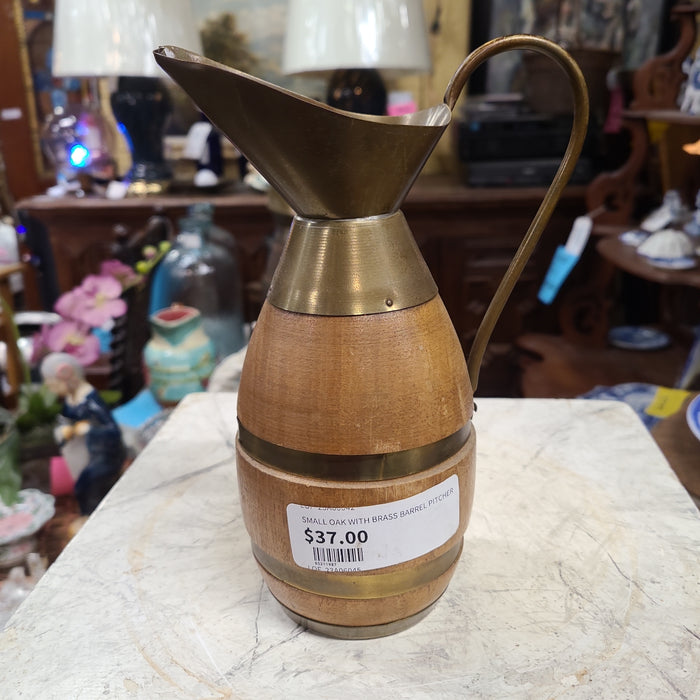 SMALL OAK WITH BRASS BARREL PITCHER