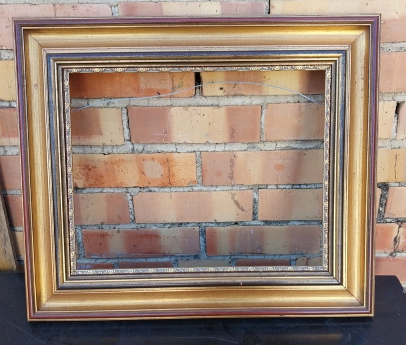SIMPLE BRONZE GILT AND RED WOOD FRAME