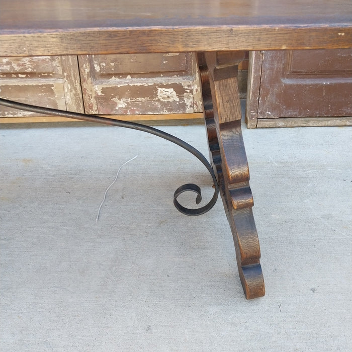 LARGE DARK OAK SPANISH IRON TRESTLE BASE TABLE