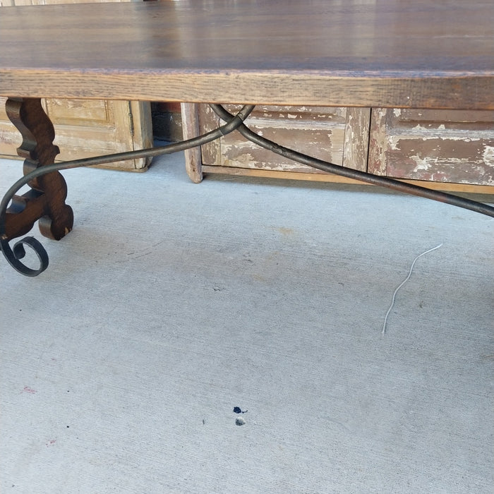 LARGE DARK OAK SPANISH IRON TRESTLE BASE TABLE