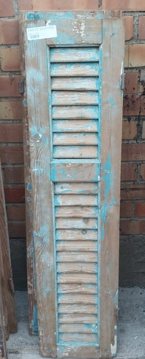 PAIR OF DISTRESSED SHUTTERS WITH BLUE PAINT