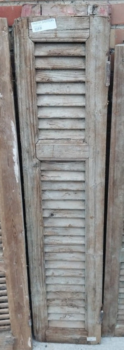 PAIR OF DISTRESSED SHUTTERS WITH PINK PAINT