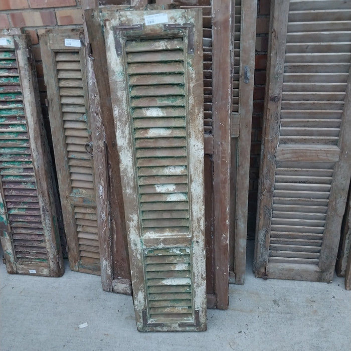 PAIR OF DISTRESSED SHUTTERS WITH GREEN PAINT