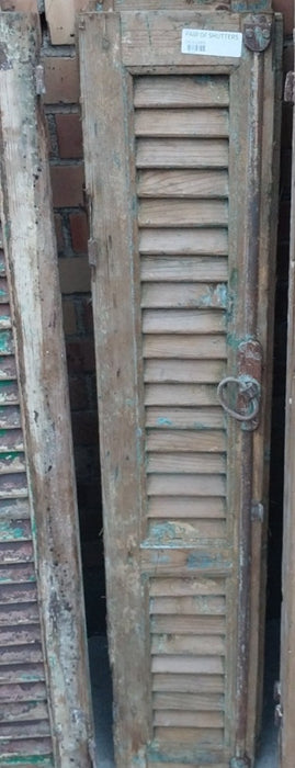 PAIR OF DISTRESSED SHUTTERS WITH GREEN PAINT