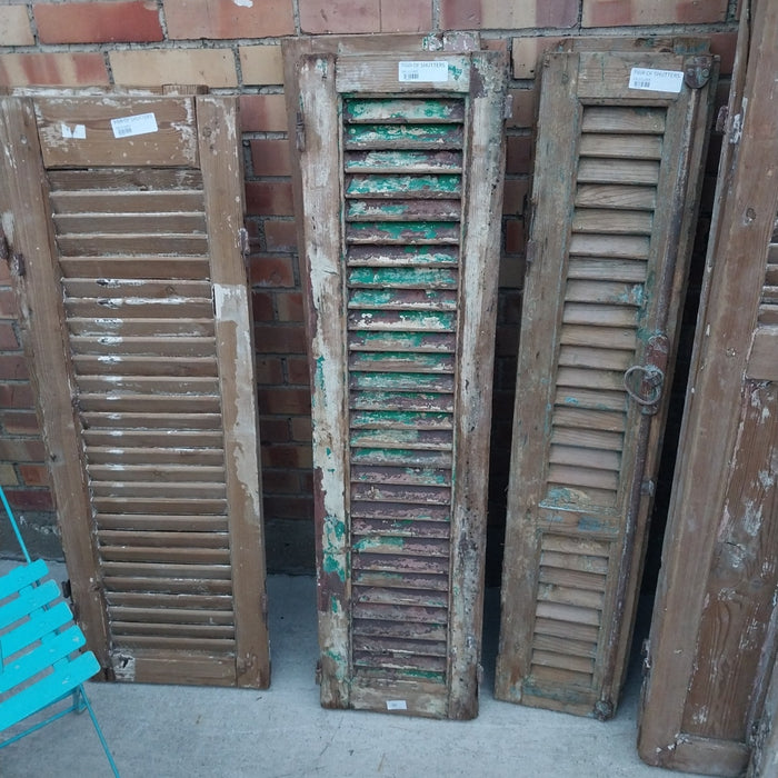 PAIR OF DISTRESSED SHUTTERS WITH GREEN PAINT