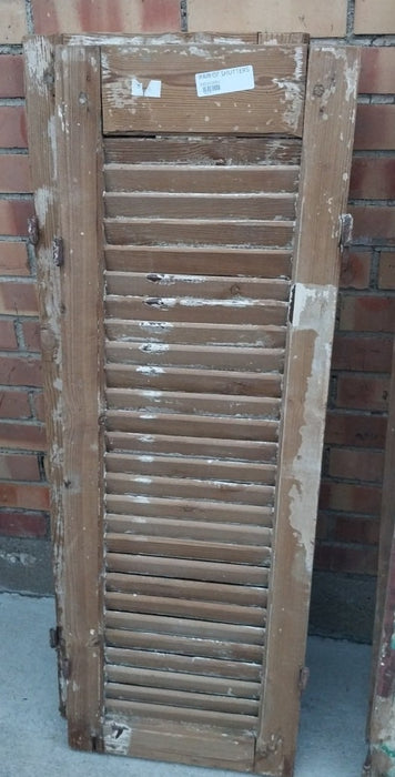 PAIR OF DISTRESSED SHUTTERS WITH BROWN PAINT