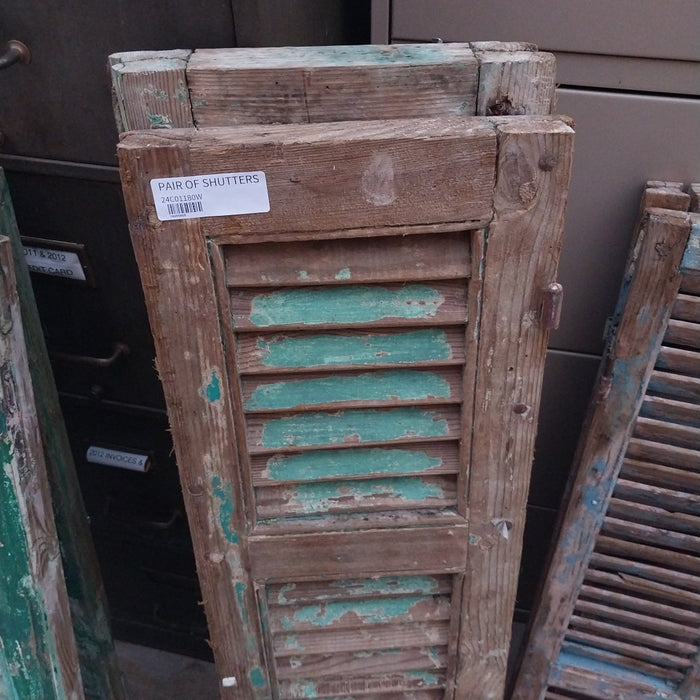 PAIR OF DISTRESSED SHUTTERS WITH GREEN PAINT