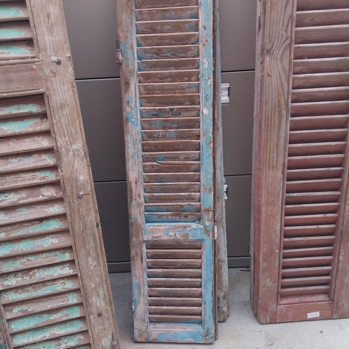 PAIR OF DISTRESSED SHUTTERS WITH BLUE PAINT