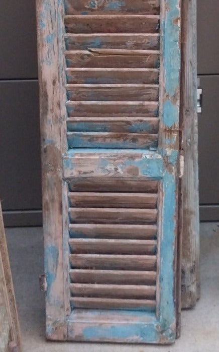 PAIR OF DISTRESSED SHUTTERS WITH BLUE PAINT