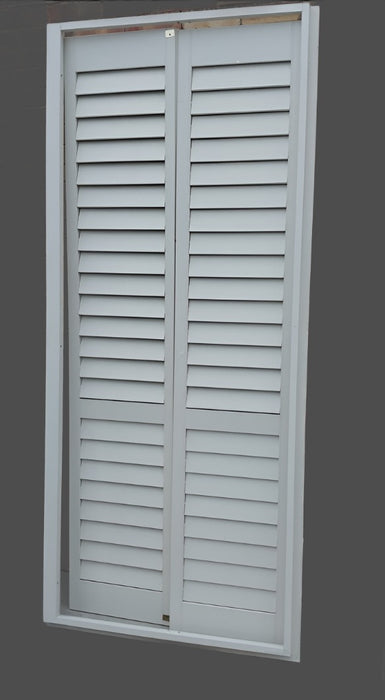PAIR OF INTERIOR SHUTTERS IN FRAME