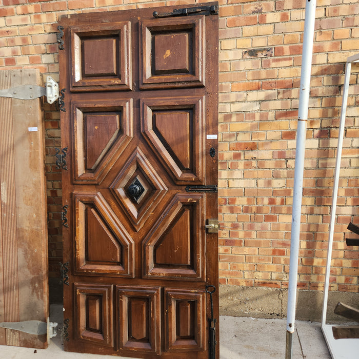 HEAVY OAK PANELED DOOR