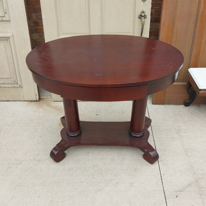 AMERICAN RIBBON CUT MAHOGANY OVAL LIBRARY TABLE