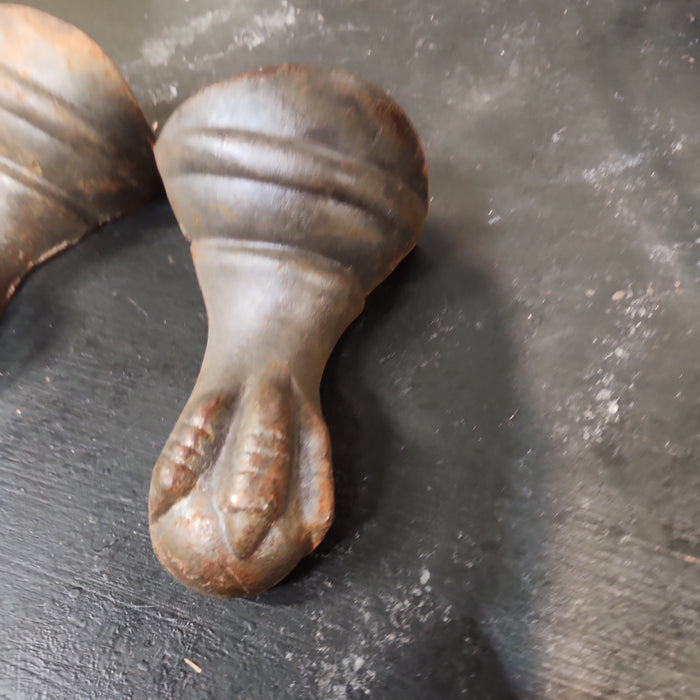 SET OF 4 CAST IRON CLAW FEET FROM A BATH TUB