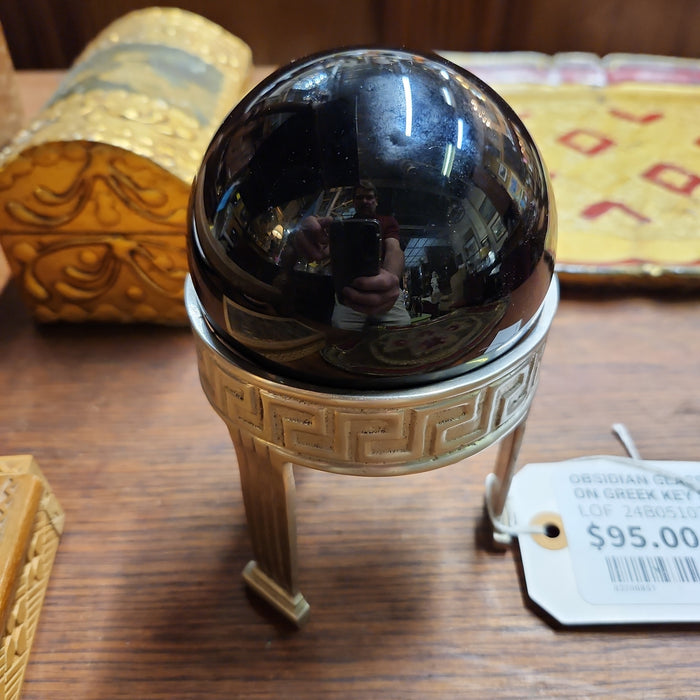 OBSIDIAN GLASS COBALT BALL ON GREEK KEY STAND