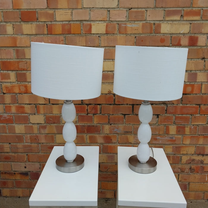 PAIR OF MODERN GLASS AND CHROME TABLE LAMPS