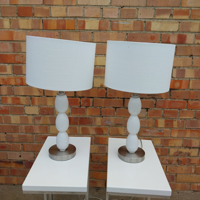 PAIR OF MODERN GLASS AND CHROME TABLE LAMPS