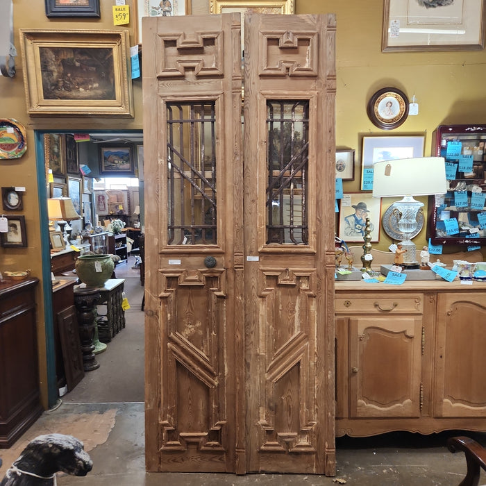 PAIR OF TALL PRIMITIVE EGYPTIAN DOORS WITH IRON INSETS AND GEOMETRIC DESIGN