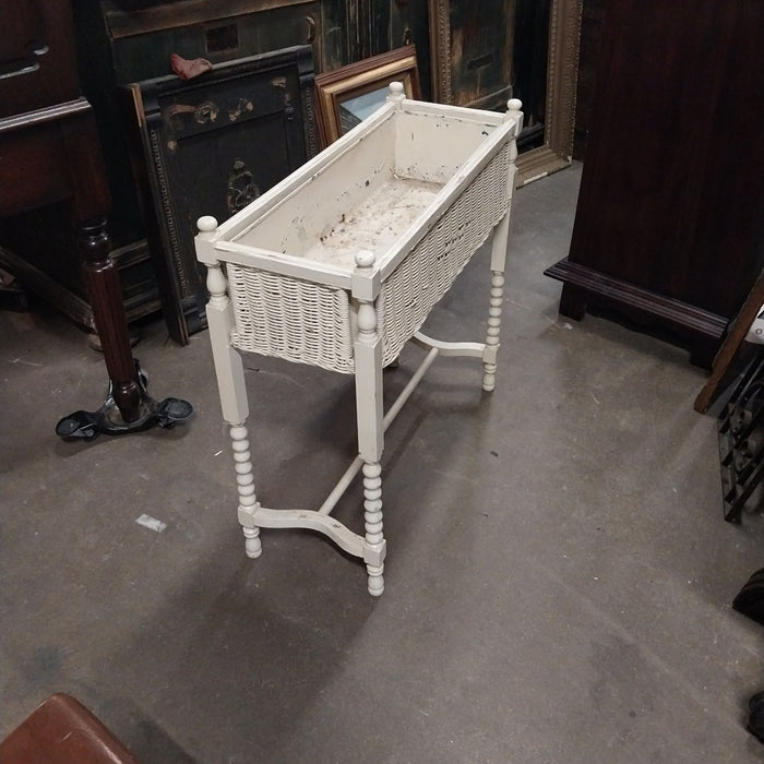 WHITE WICKER PLANTER ON LEGS