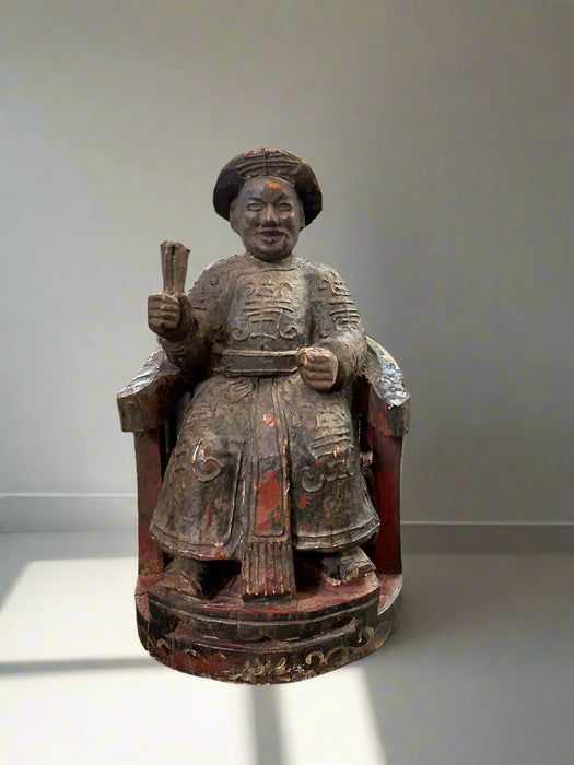 CARVED WOOD SITTING ASIAN MAN