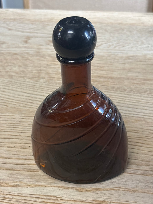 SMALL SHAPED BROWN GLASS FLAT BOTTOM DECANTER