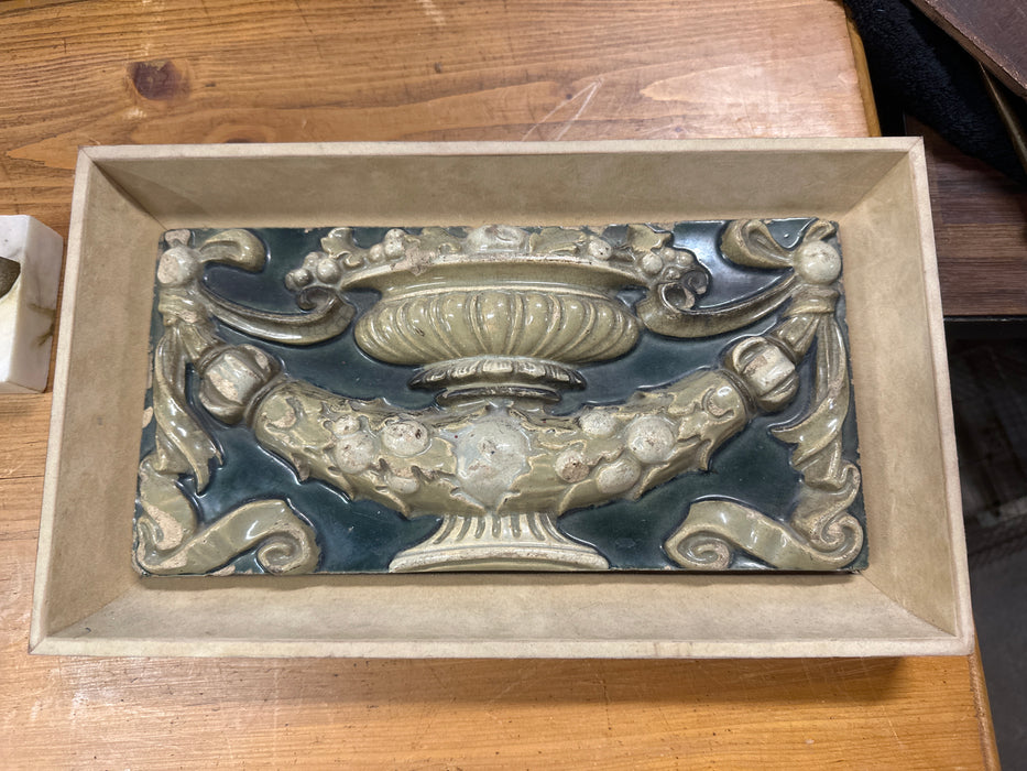 FRAMED GLAZED TERRA COTTA BUILDING FRAGMENT
