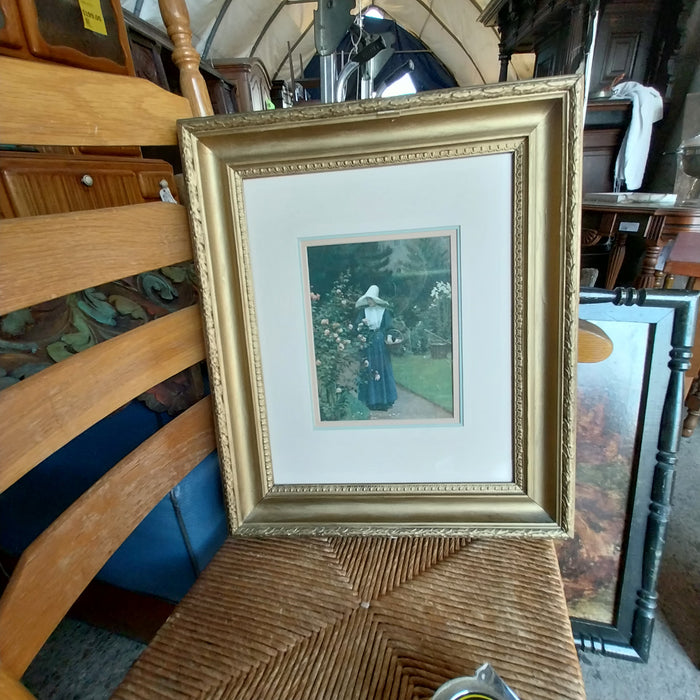 NICELY FRAMED PRINT OF LADY IN GARDEN